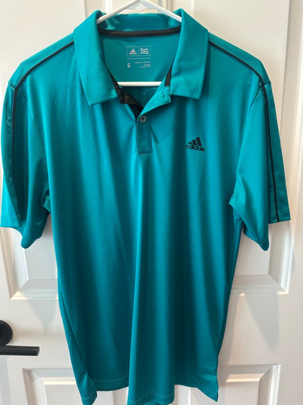 Like new. Adidas golf mens polo. Size small. Teal w black trim